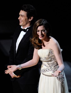 Presenters James Franco and Anne Hathaway speak onstage at the 83rd Annual Academy Awards