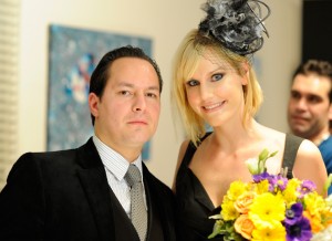 Michael Stervinou poses with designer Amy Marie Goetz at the Amy Marie Goetz Women's Wear Fashion Show held at Agenda Loft