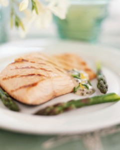 Salmon and asparagus dish, close-up (Photo by Jonelle Weaver, Getty Images)