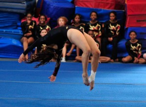 Wilson H.S. Girls Gymnastic Student Melissa Martinez Competing in Floor Exercise (Photo by Arun Nevader)
