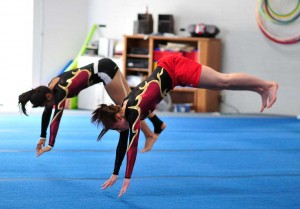 Wilson H.S. Girl's Gymnastics with (R) Nicole Mouser and (L) Tajaira Moreno (Photographed by Arun Nevader)