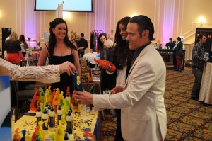 Ali Saam (ARGO), Kaylene Peoples (AGENDA Magazine) and founder Christine Creed at her Beach Girls booth at Kathy Duliakas's 5th Annual Oscar® Suite & Party Photo Manuel Carrillo