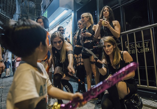 HONG KONG - OCTOBER 31:  Revelers dressed up in customes participlate a Halloween event at Lan Kwai Fong on October 31, 2015 in Central district, Hong Kong. Halloween -- a named taken from 'All Hallows' Even' falls on the day before All Saints' Day on November 1 -- a holiday when Christians remember their deceased loved ones.  (Photo by Anthony Kwan/Getty Images)