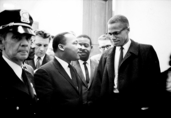 Martin Luther King and Malcolm X waiting for press conference on March 26, 1964 (Photo: Marion S. Trikosko)